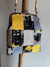 将图片加载到图库查看器,写乐/手拿包