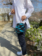 将图片加载到图库查看器,鲸鱼扣袋